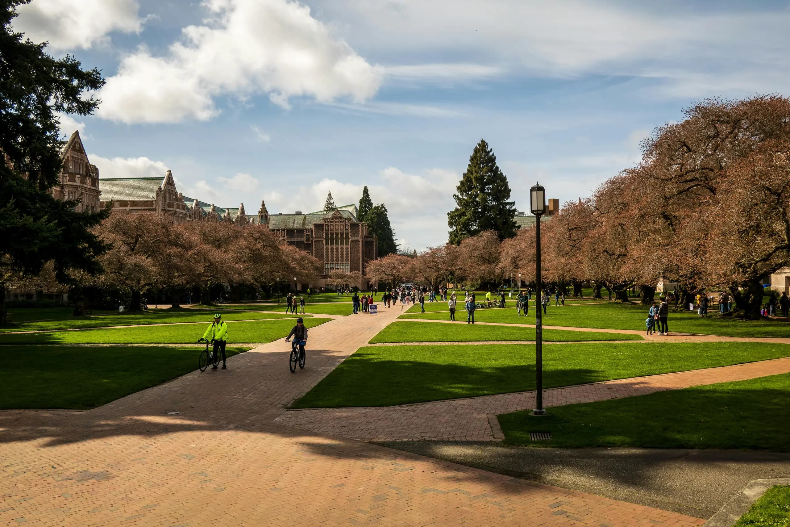 Central square or plaza with lawn, paths, and classical building